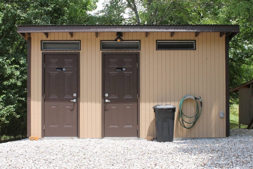 1/2 bath and separate 3/4 bath with electric, water & septic