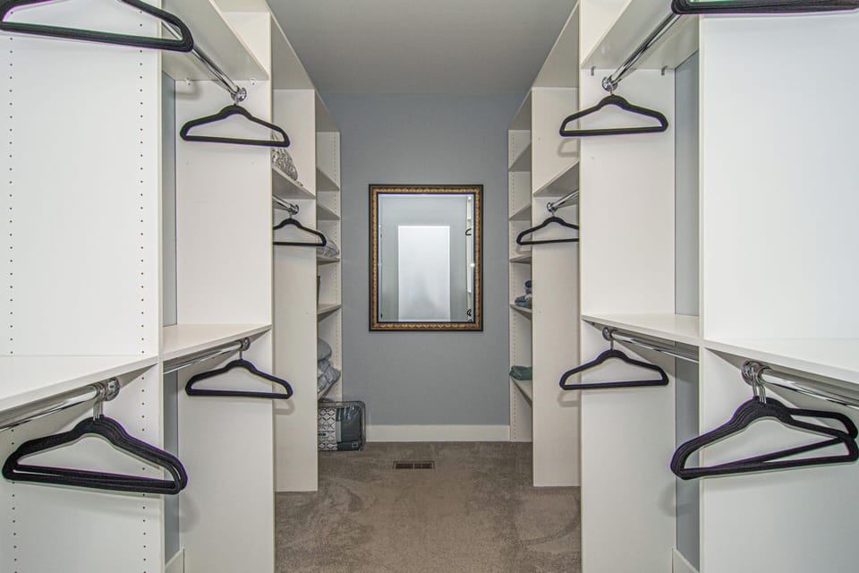 Upper- Master Walk-in Closet