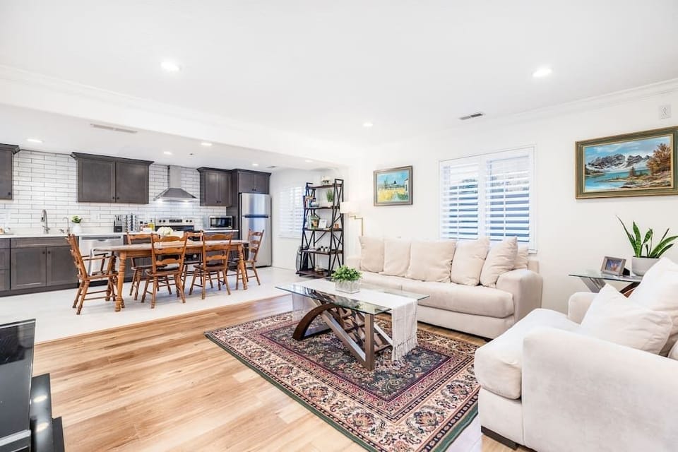 Open concept living, kitchen, and dining room.