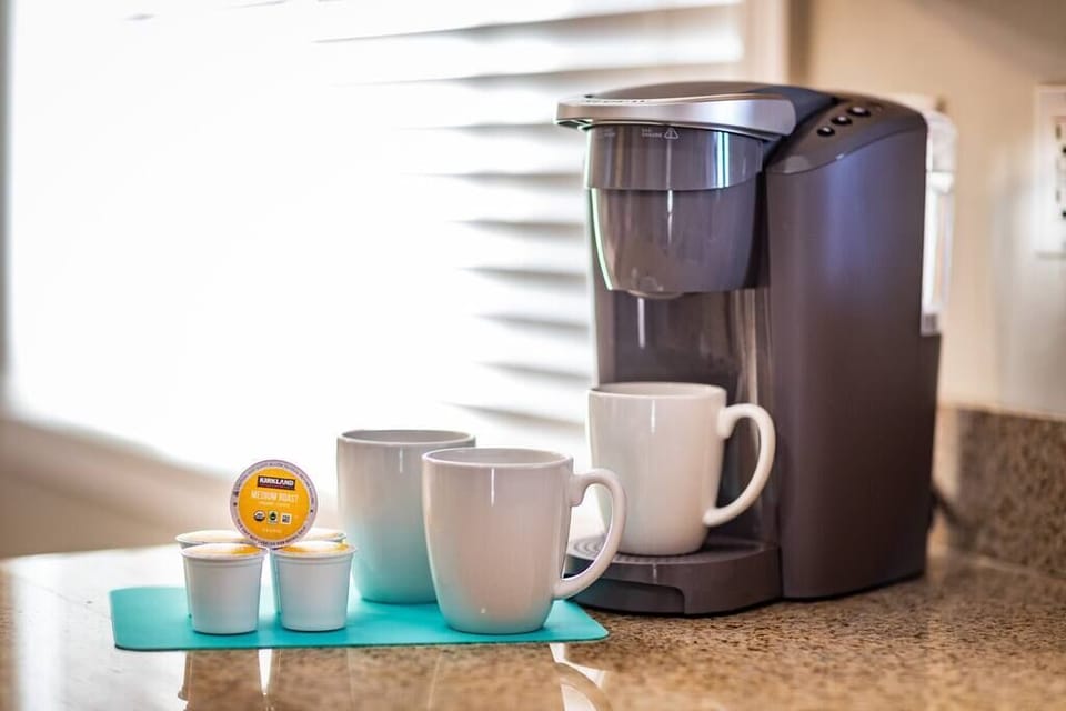 The kitchen has all the small appliances you might need during your stay!