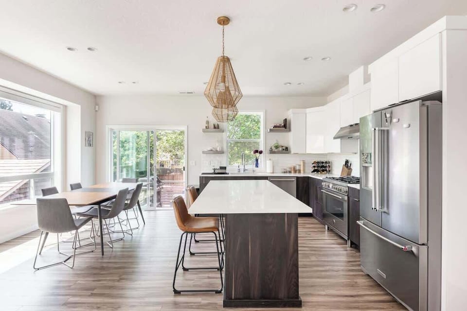 The heart of the home. Large kitchen island with bar seating plus a dining table perfect for six guests