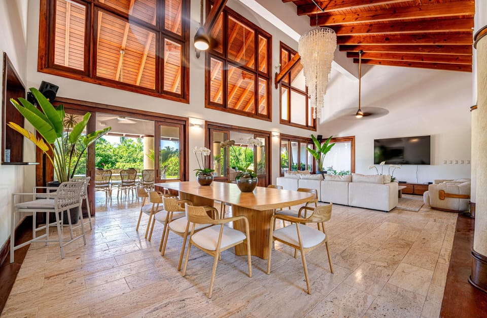Indoor dining with seating for 10. Living room with smart TV, bluetooth speakers