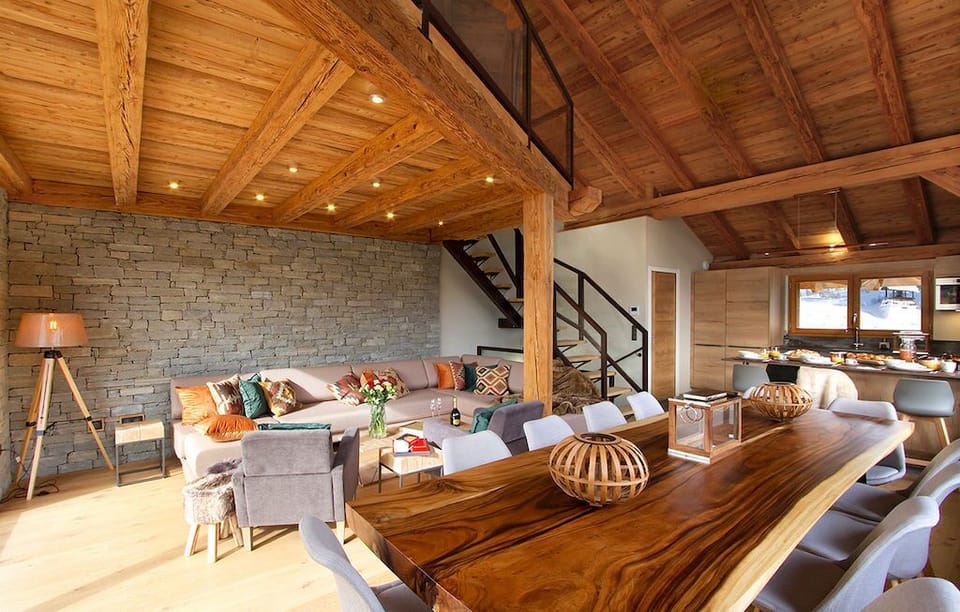 Take a seat at the wooden dining table.