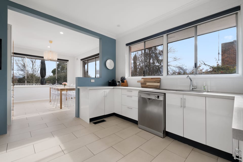 Chef's knives, Nespresso coffee machine and open-plan breakfast room.