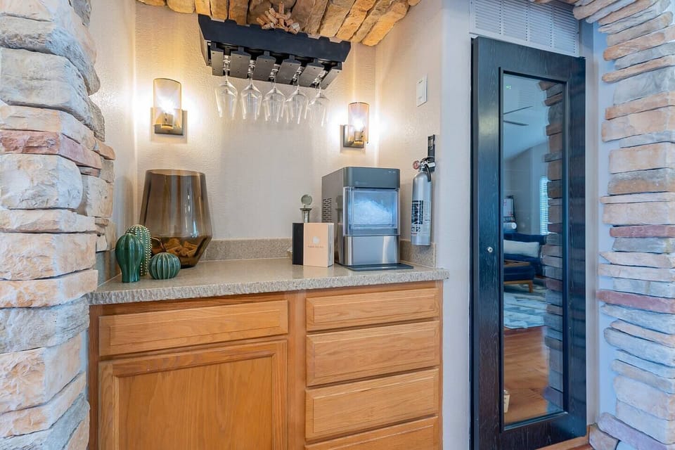 Enjoy a glass of wine with this phenomenal wine bar with an ice maker.