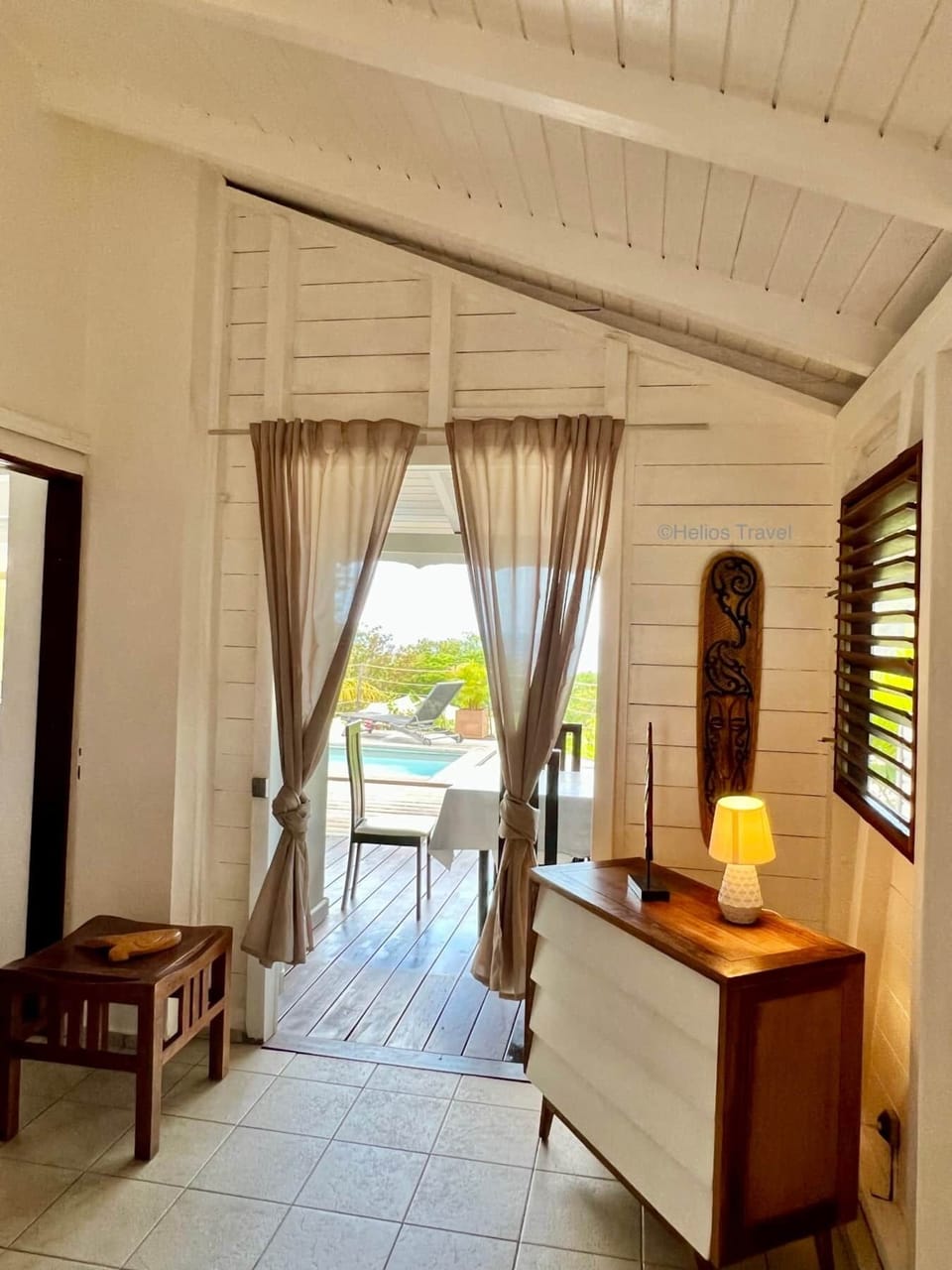 The 1st bedroom and the sea and swimming pool view