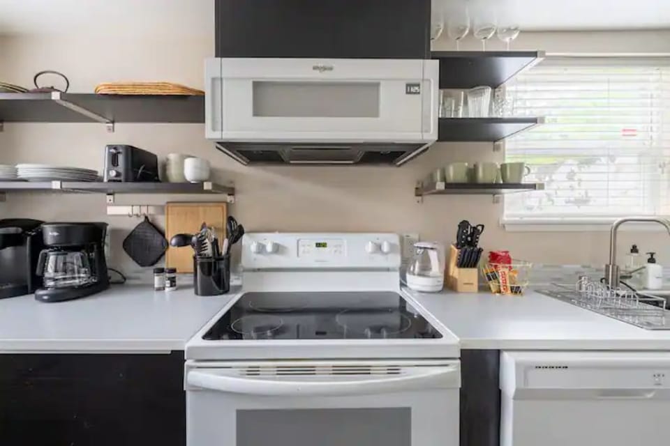 Kitchen with electric cooktop, drip & keurig coffee makers, glass water kettle