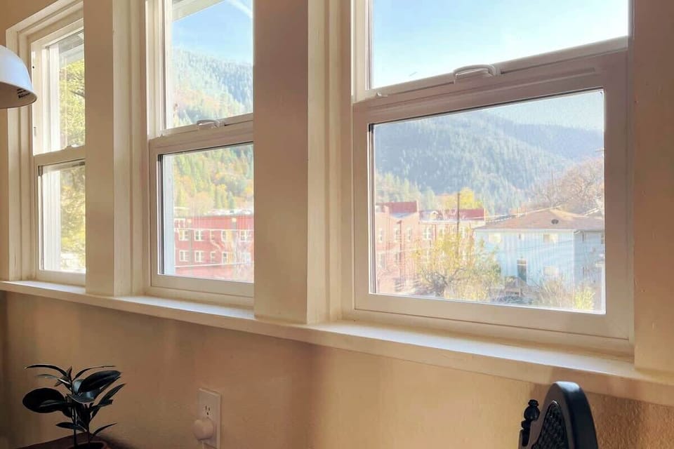 The dining room has a view of the mountains that roll down to the valley where Dunsmuir is nestled right in the trees. You will see some beautiful historic red buildings in the distance. This is certainly a place that is in touch with nature.