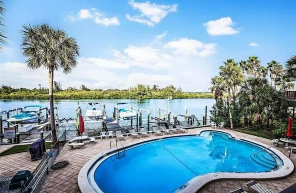 Wake up to this beautiful view of the pool and to the intercoastal waterways.