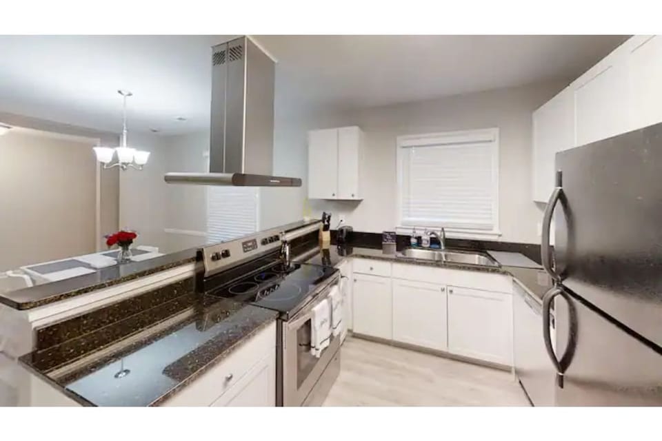 Open kitchen with serving bar.