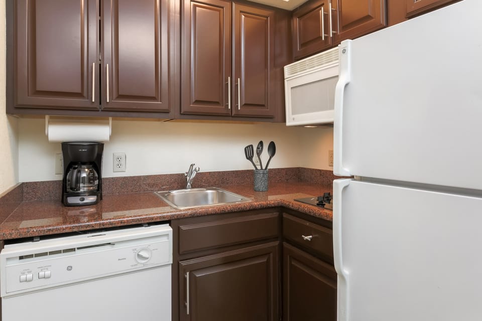 Curb your appetite by cooking a meal in your kitchen.