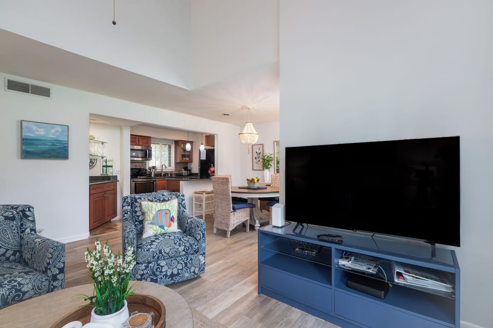 The great room is open to the dining area and the kitchen