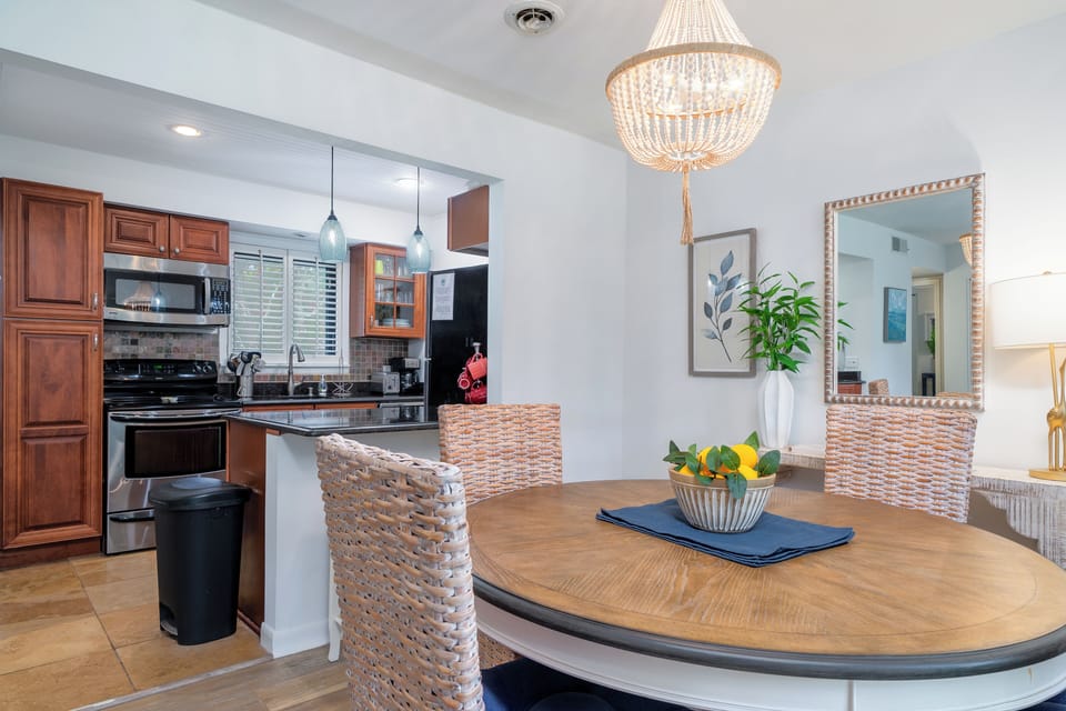 The kitchen breakfast bar has stool seating for two