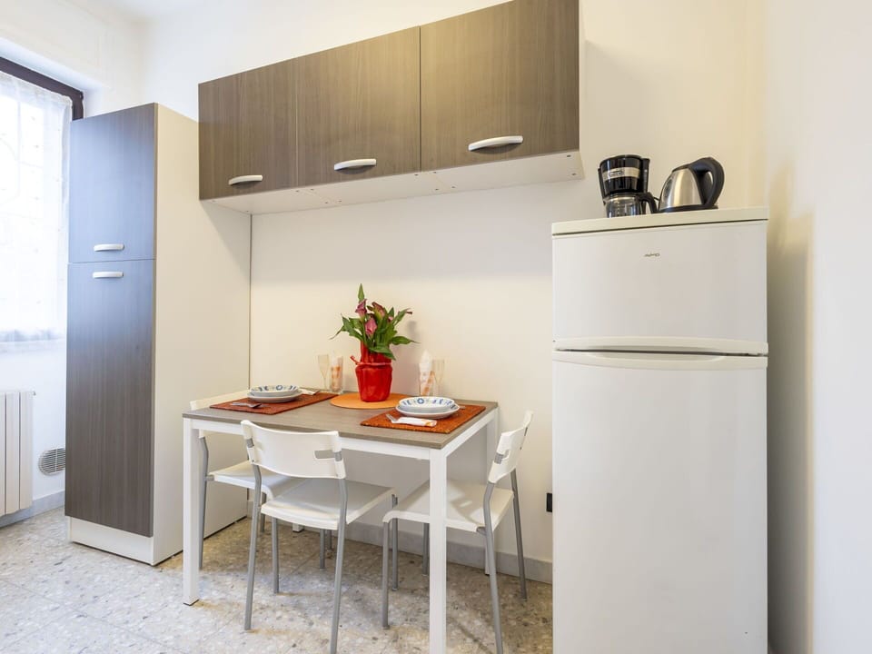 Furniture, Interior Design, Wood, Major Appliance, Kitchen Appliance, Flooring, Kitchen, Room, Floor, Lighting