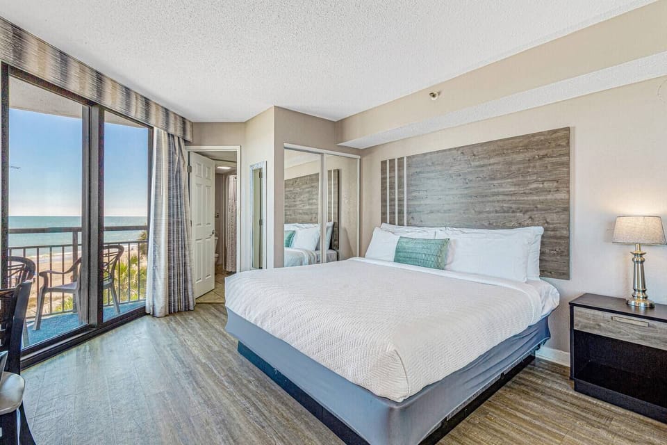 Experience a wave-kissed retreat in the oceanfront suite's bed, where the gentle sounds of waves provide a soothing lullaby for a restful and rejuvenating sleep.