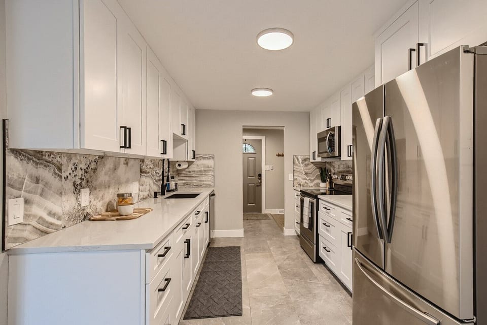 Sleek, updated and modern kitchen.