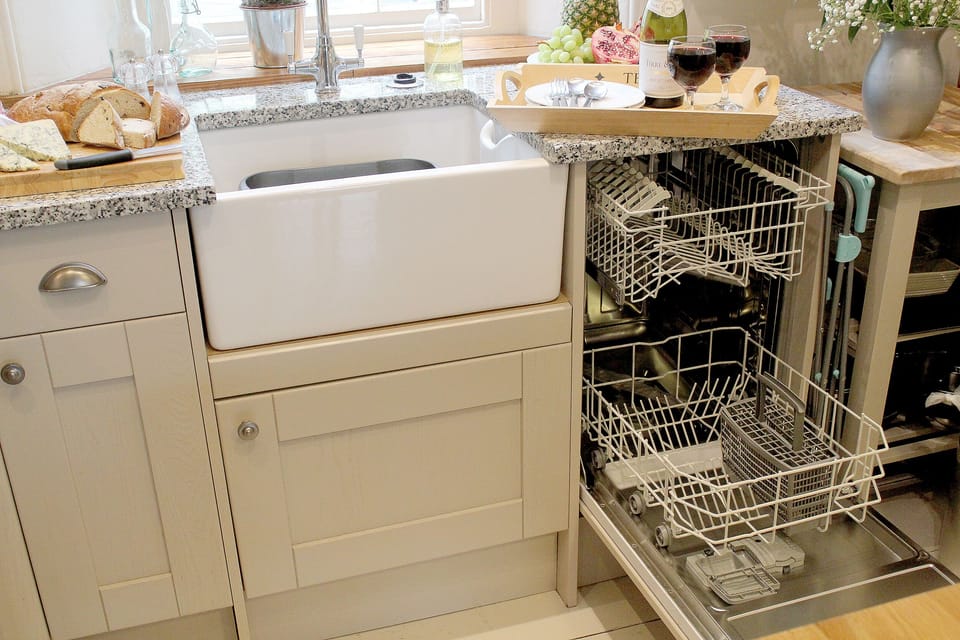 Belfast sink, and dishwasher in the kitchen.