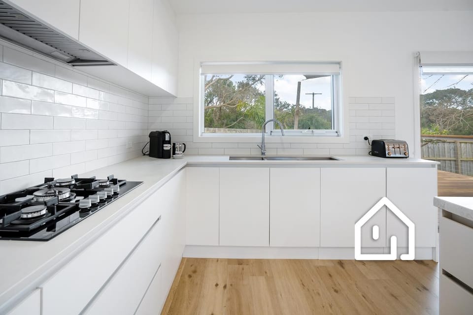 A spacious and well equipped kitchen with ALDI coffee pod machine