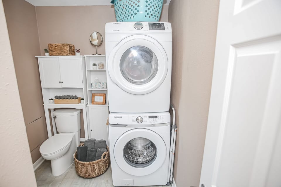Washer + dryer in master bathroom