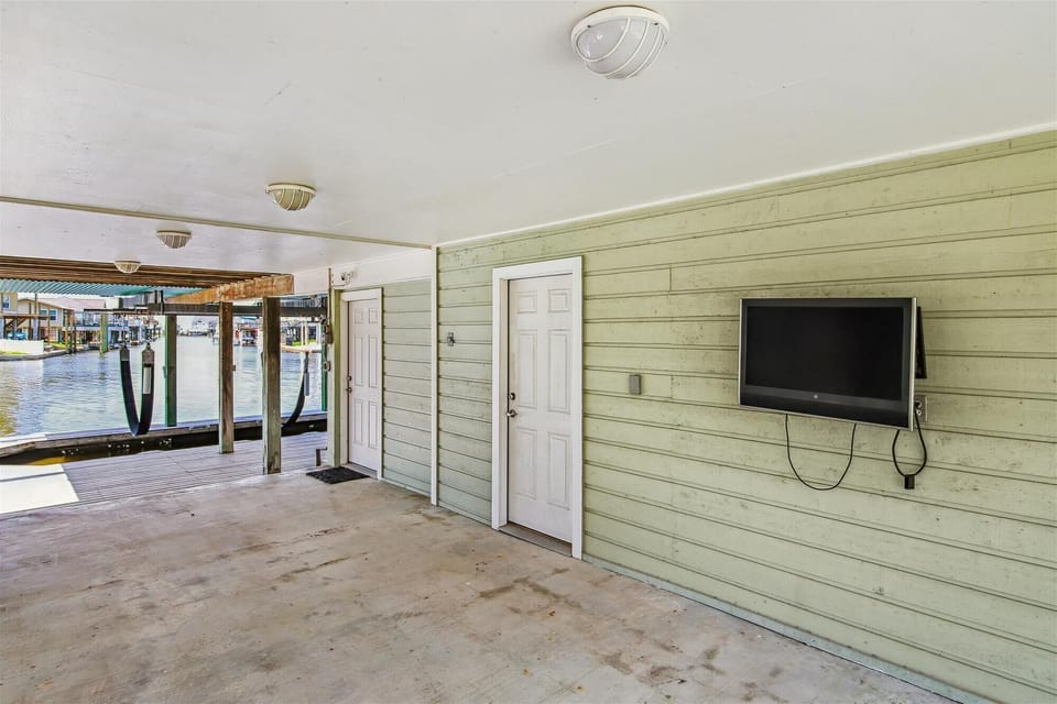 Large Patio - Our spacious patio is the perfect place to gather the family and enjoy the beautiful yard. The salt-laced breezes are definitely a plus!