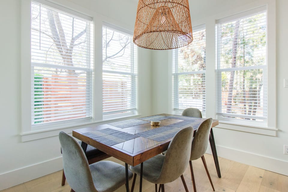 4 chairs and a dining bench
