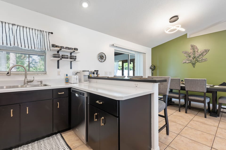 Kitchen and dining area.  Seating for 6 at the table + 3 more at breakfast bar