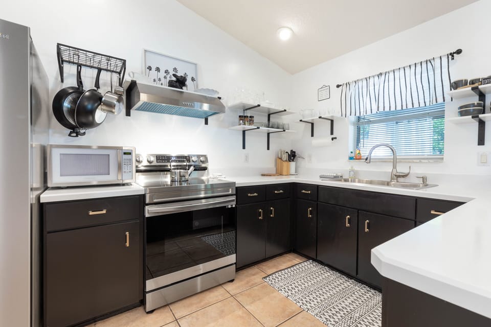 Updated, fully stocked kitchen with new appliances