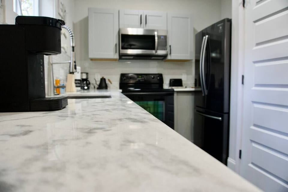 Newly renovated full kitchen with new appliances and beautiful countertops