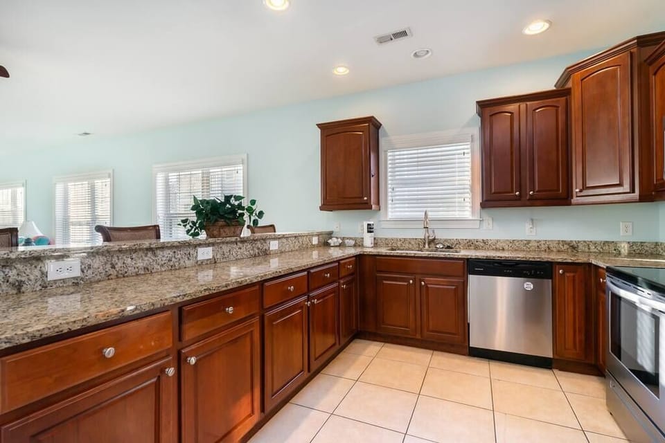 Spacious full kitchen with countertop bar seating