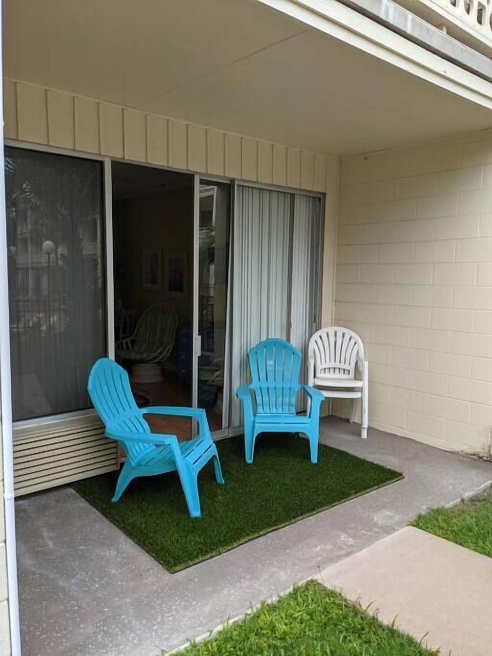 Outdoor seating with view of pool