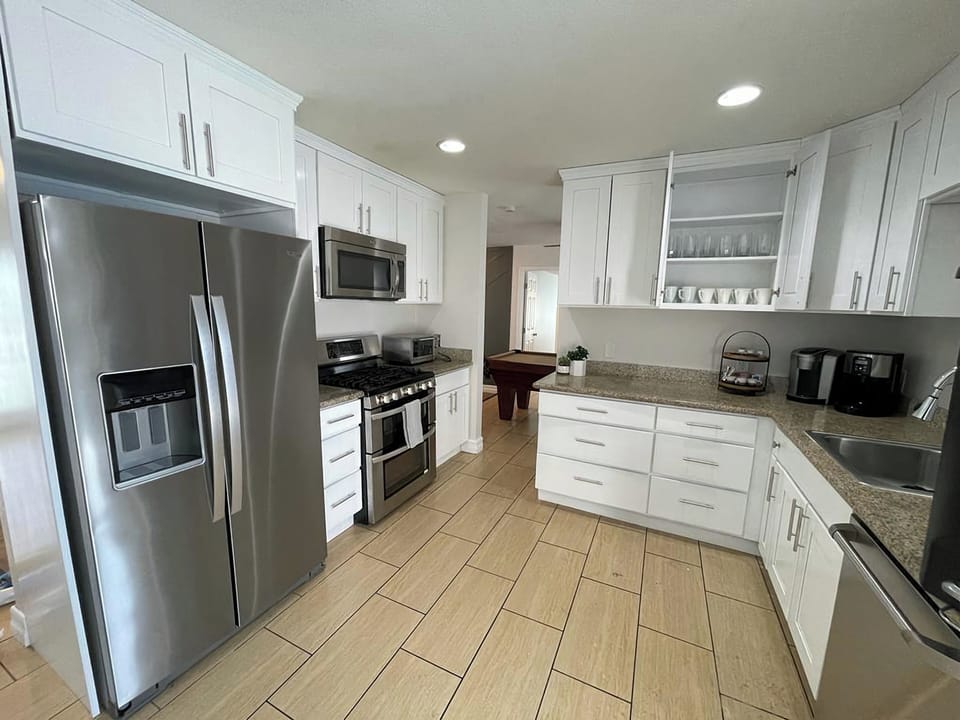 stove , oven, refrigerator,dishwasher, coffee maker toaster and microwave.