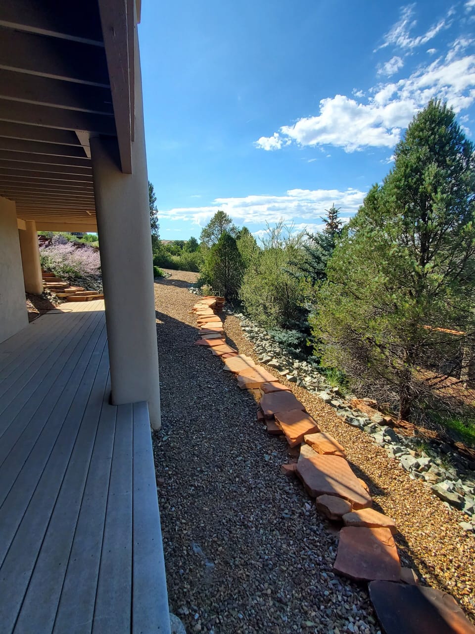 Deck, open space and driveway.