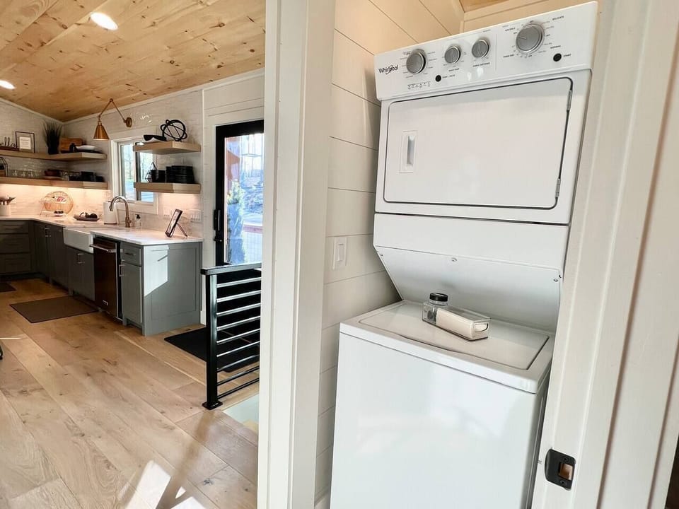 The house is equipped with a stacking washer and dryer.  Initial supply of laundry pods and dryer sheets are provided.  