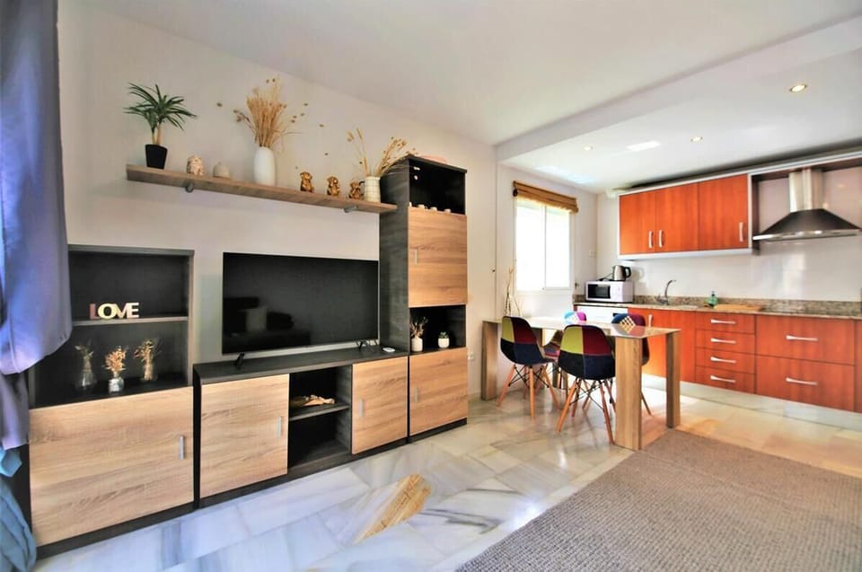 Modern lounge with large TV with Sky TV