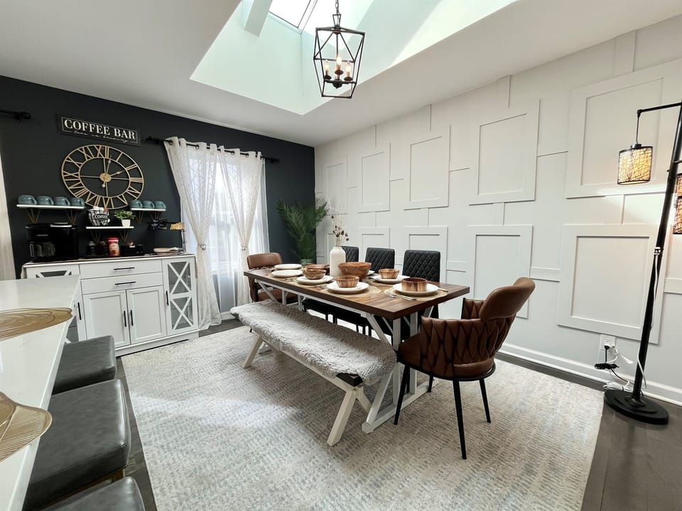 Beautiful dining room with Skylight and coffee bar, open kitchen