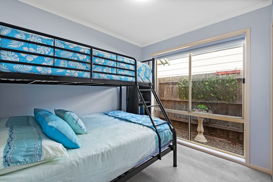 Tri bunk room with window view