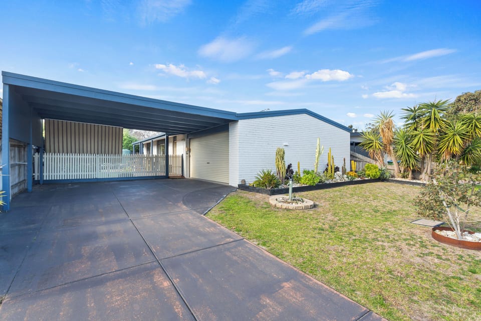 Front of home and spacious parking area
