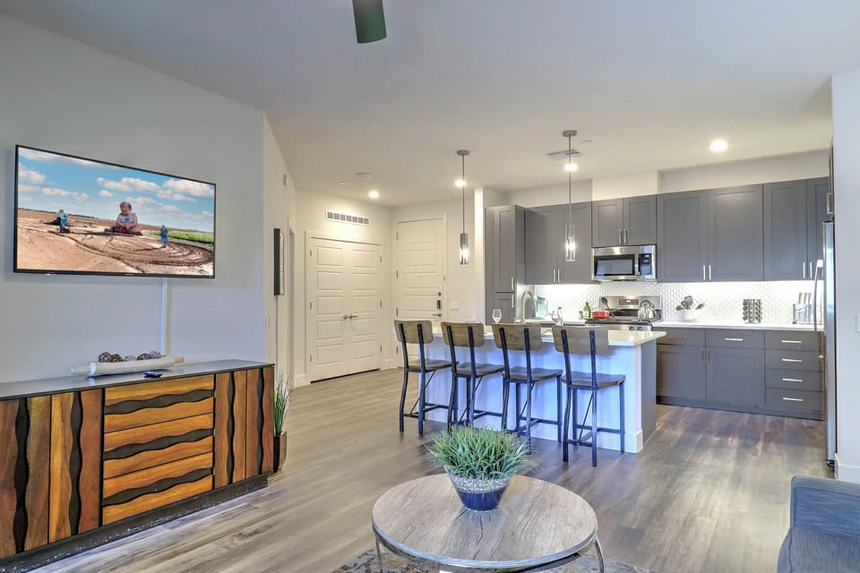 Whip up meals in the modern kitchen, fully stocked with appliances, cookware, and essentials for everyday cooking.