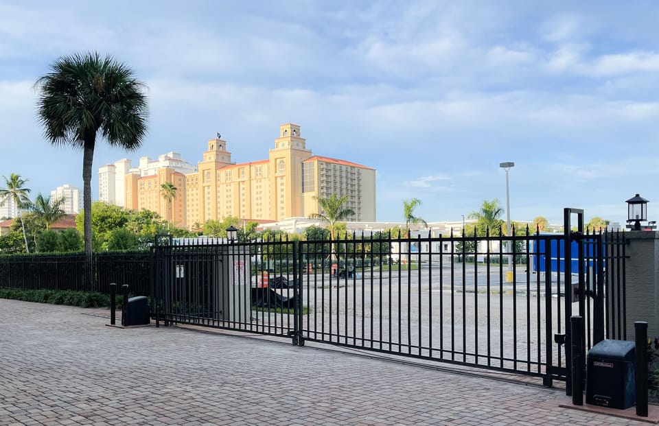 Gate view from the inside - Ritz Carlton Beach building view on the left