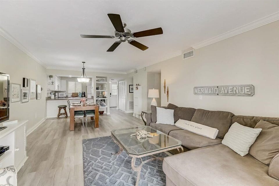 Open living/dining/kitchen.  New Luxury Vinyl flooring