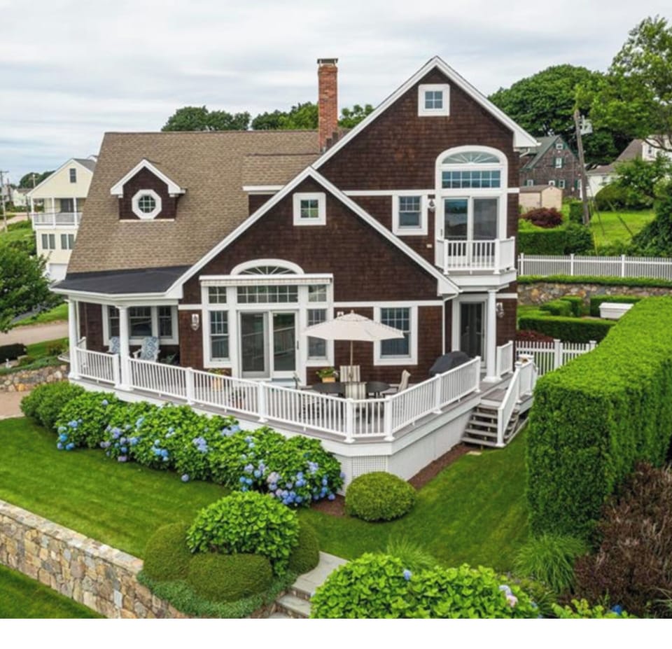 Custom Beach Home situated perfectly for ocean views! Professionally landscaped.