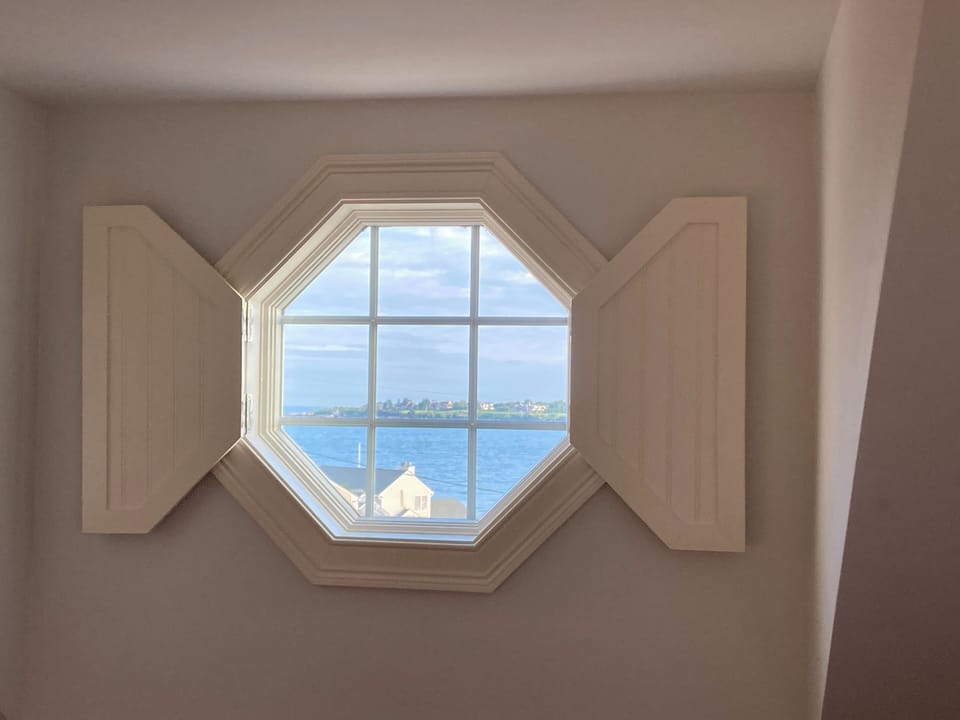 Attention to detail and custom woodwork create a marvelous frame for this vista!