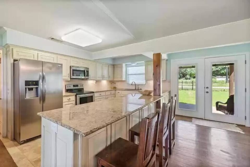 Kitchen perfect for entertaining and fully stocked with all cooking necessities!