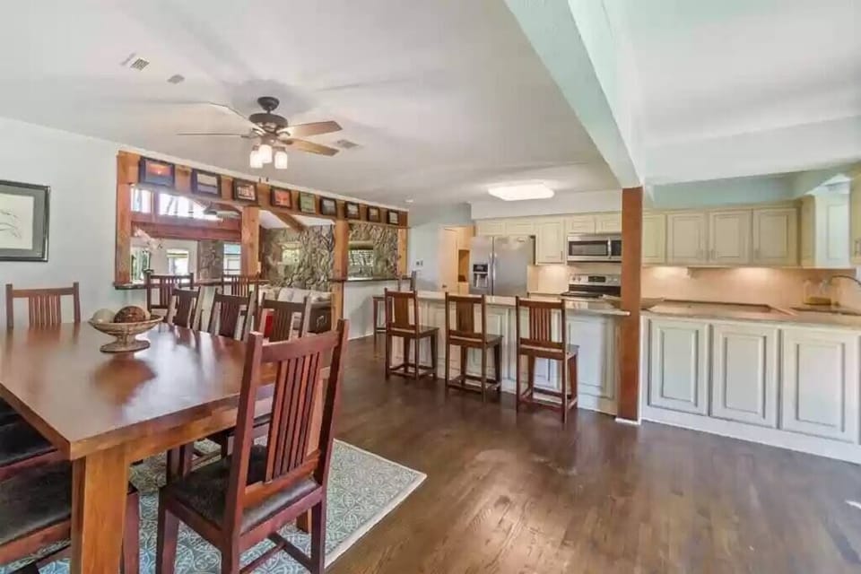 Bar top seating for 7 and large dining room table for 8!