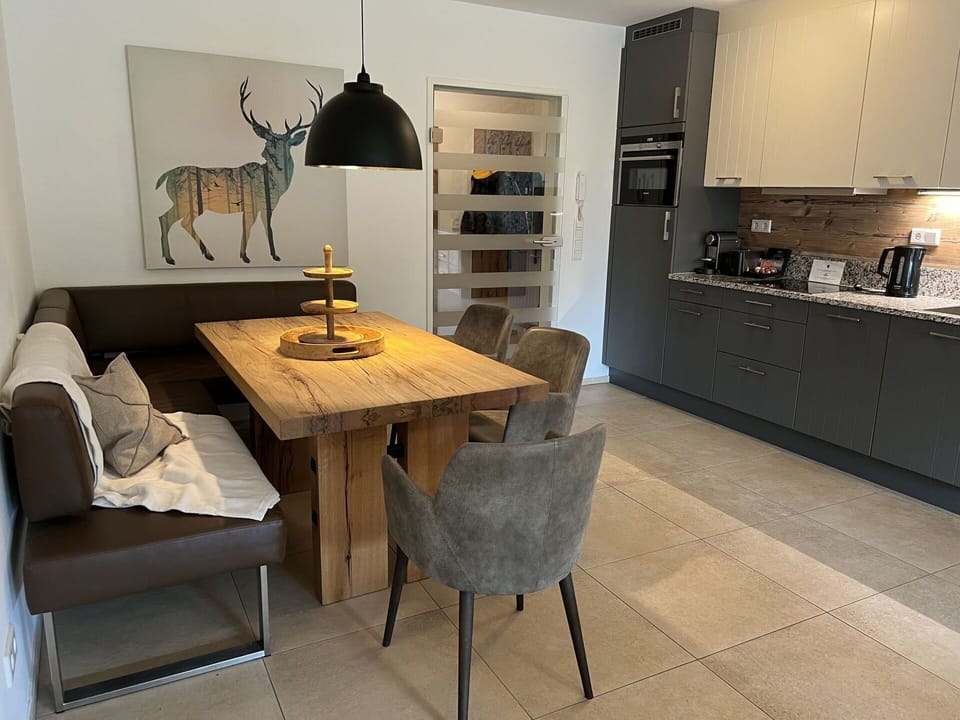 Cabinetry, Furniture, Property, Countertop, Table, Building, Chair, Wood, Lighting, Interior Design