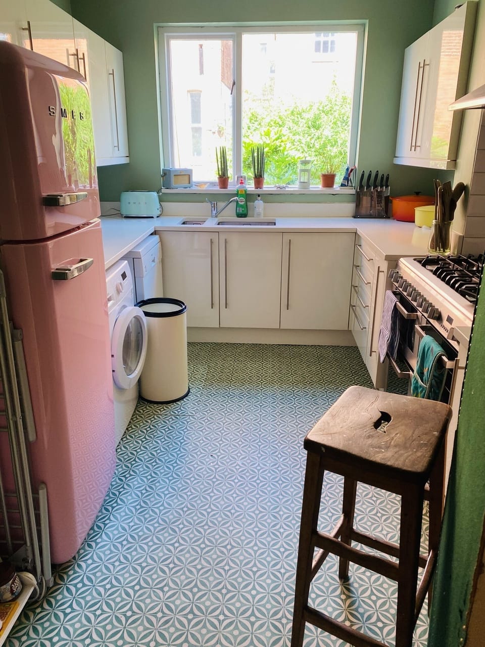 Smeg fridge and appliances. 
Dishwasher, washing machine and dryer all in here. 