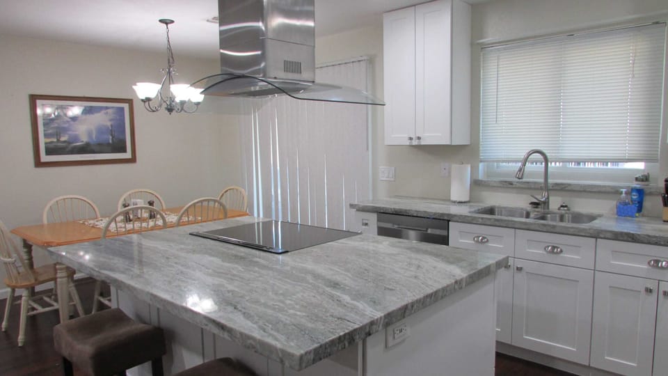Open concept kitchen with dining room