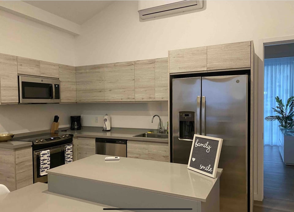 Kitchen fully equipped with pots, pans, utensils, etc.