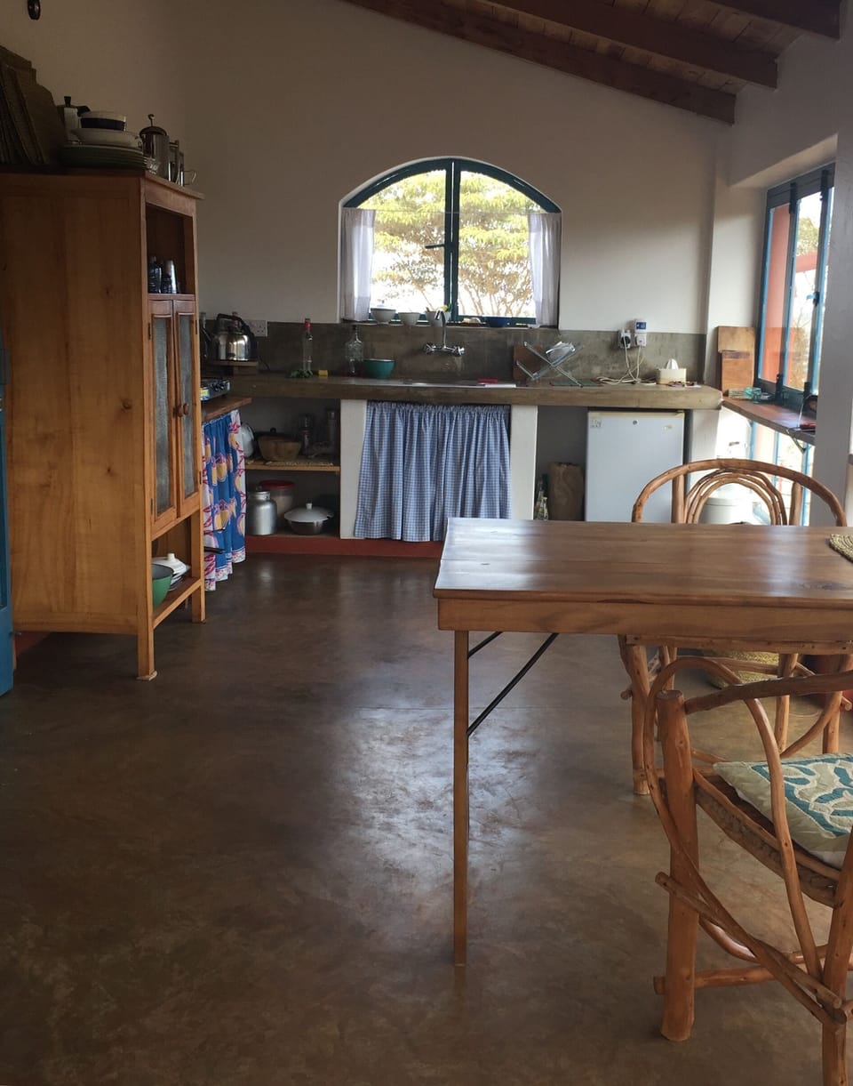 Kitchenette with small fridge and two ring gas cooker