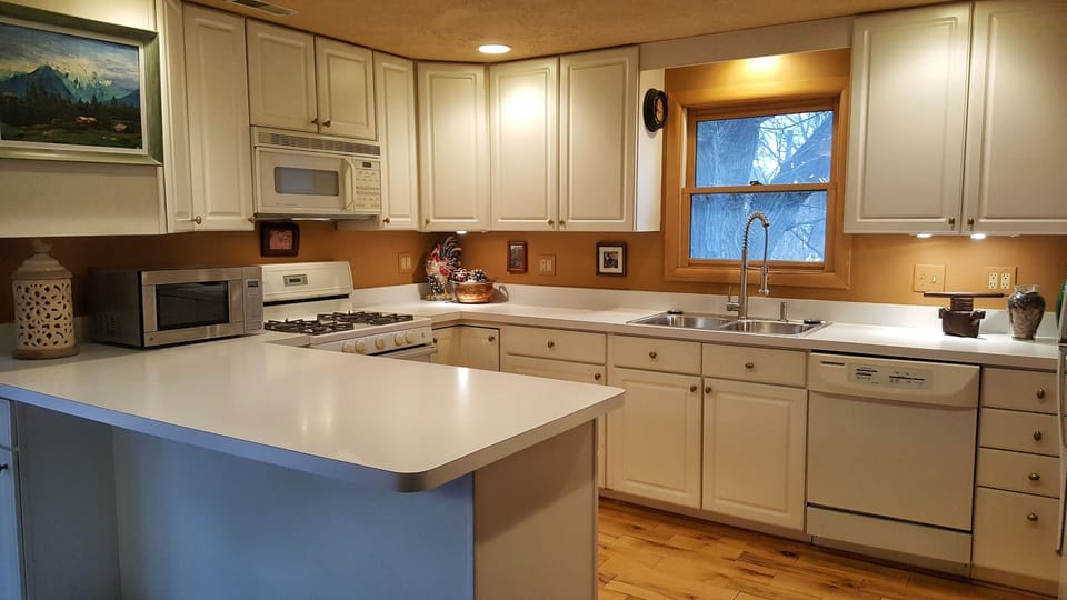 The full kitchen has everything you need for a relaxing stay, even a dishwasher 